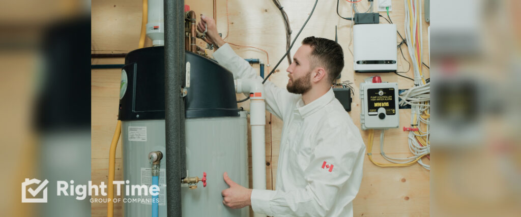 Technician inspecting a residential water heater in an Ottawa home.